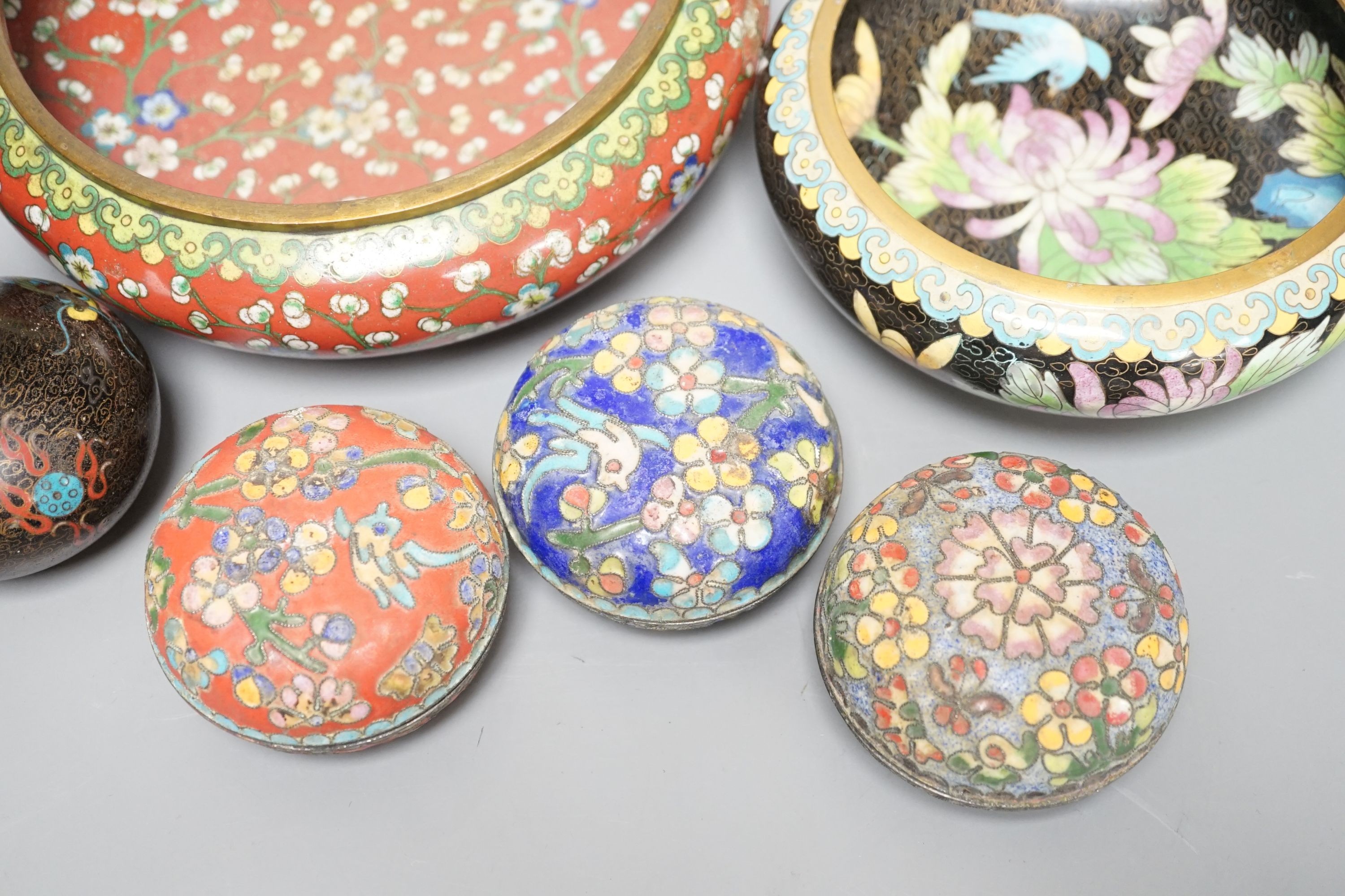 A group of Chinese cloisonné enamel dishes, boxes and a pair of vases, early 20th century and later, largest diameter 17cm